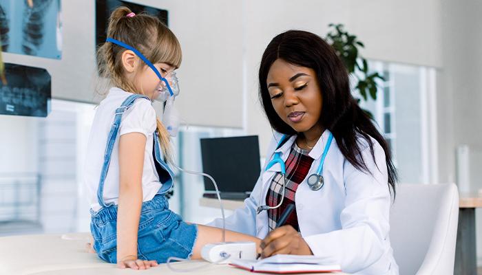 Respiratory therapist with patient